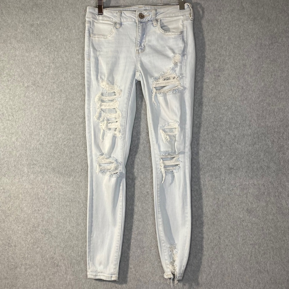 American Eagle Skinny Jeans Women 4 Light Wash Distressed Next Level Stretch EUC